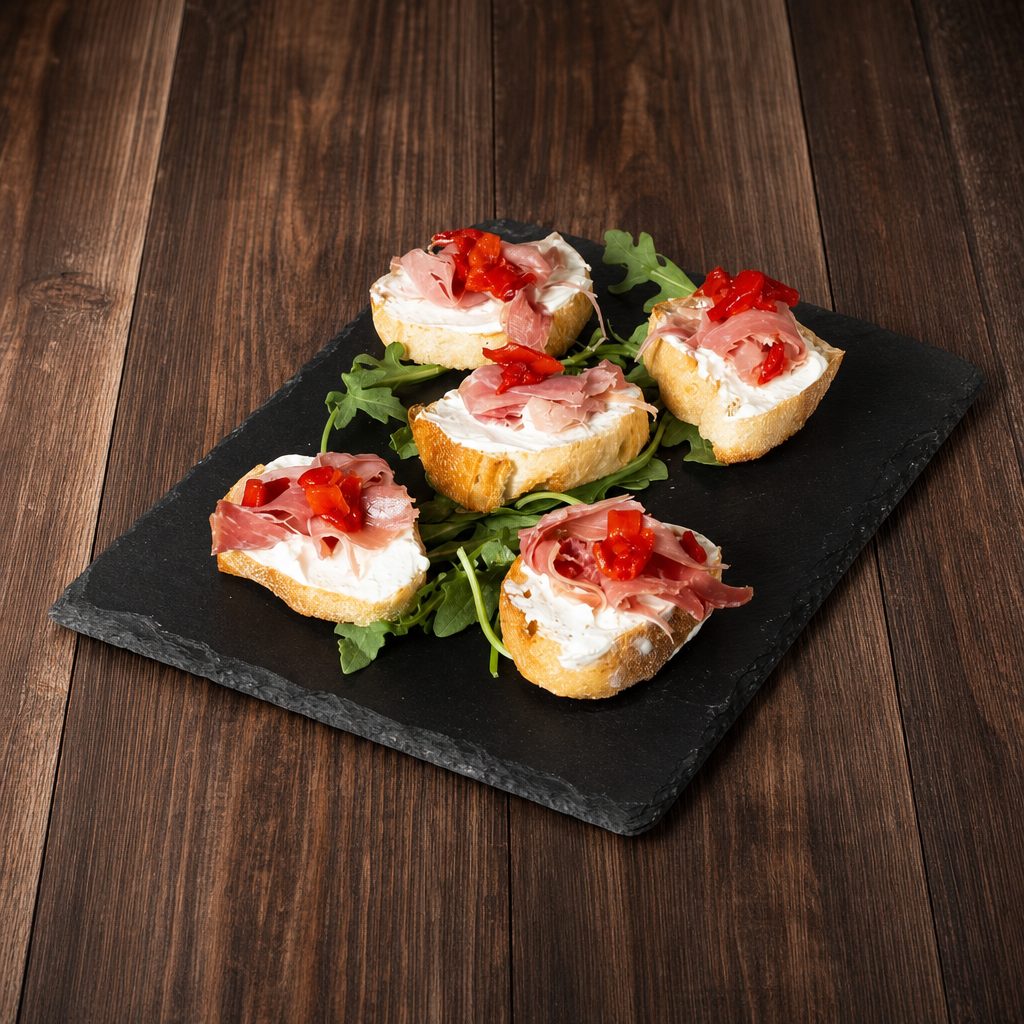 Creamy Brie & Prosciutto Crostini.